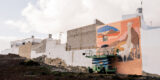 mural urbano durante el Festival Desidia en el barrio de Argana Baja.